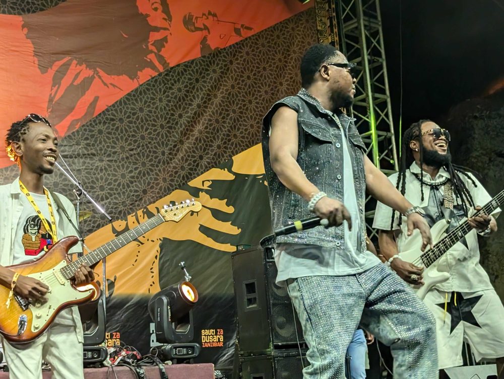 Christian Bella (center) and Malaika Band