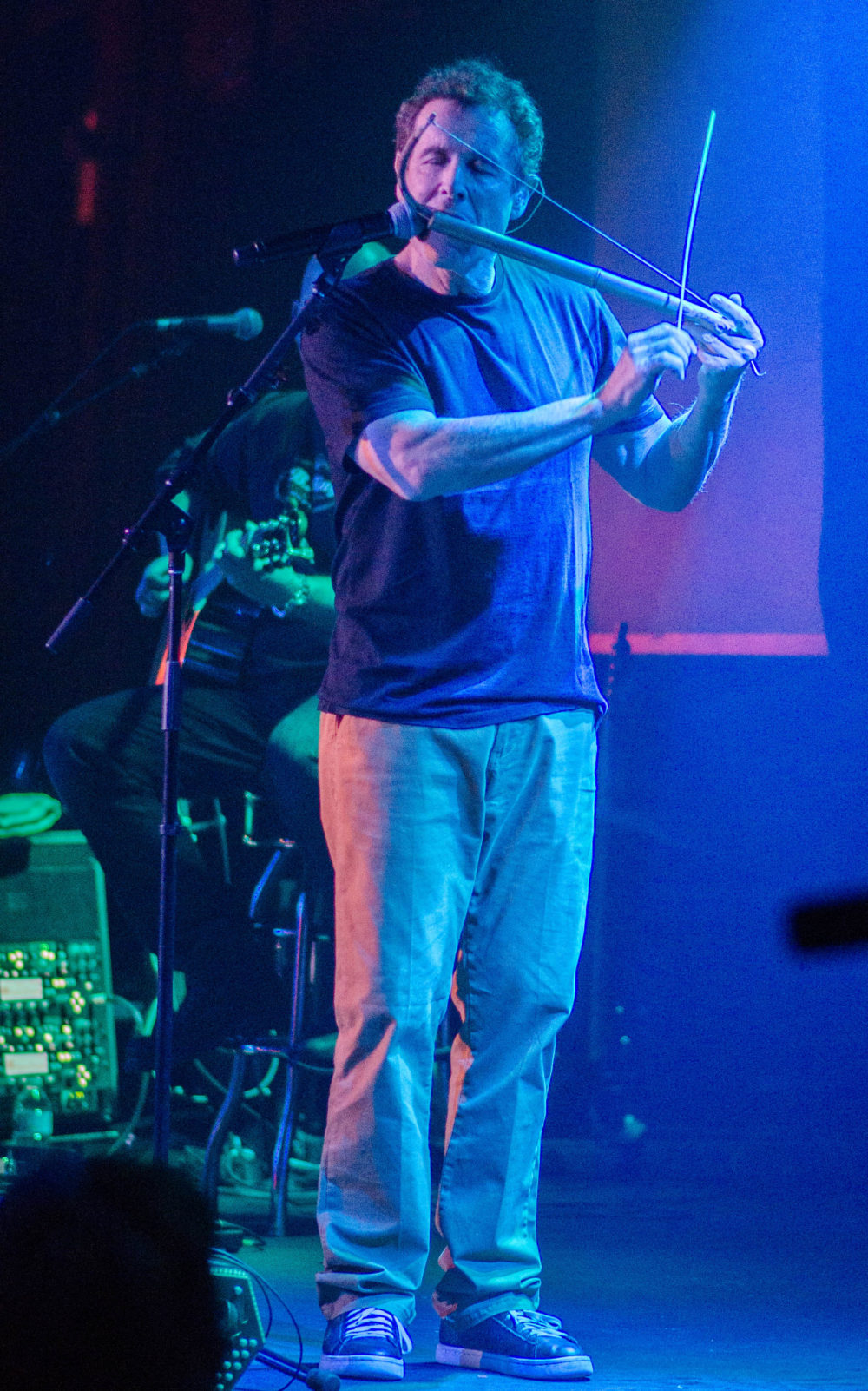 Johnny with mouth bow at B.B. King in New York (Eyre)