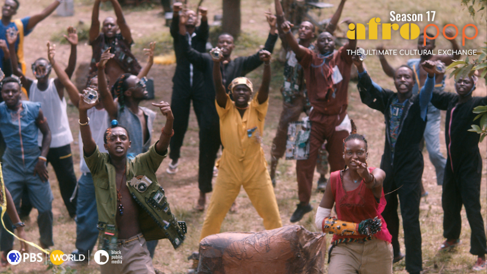 Elohel and others lift a middle finger to capture the world’s attention following a cyber attack. Photo credit: Saul Williams and Anisia Uzeyman