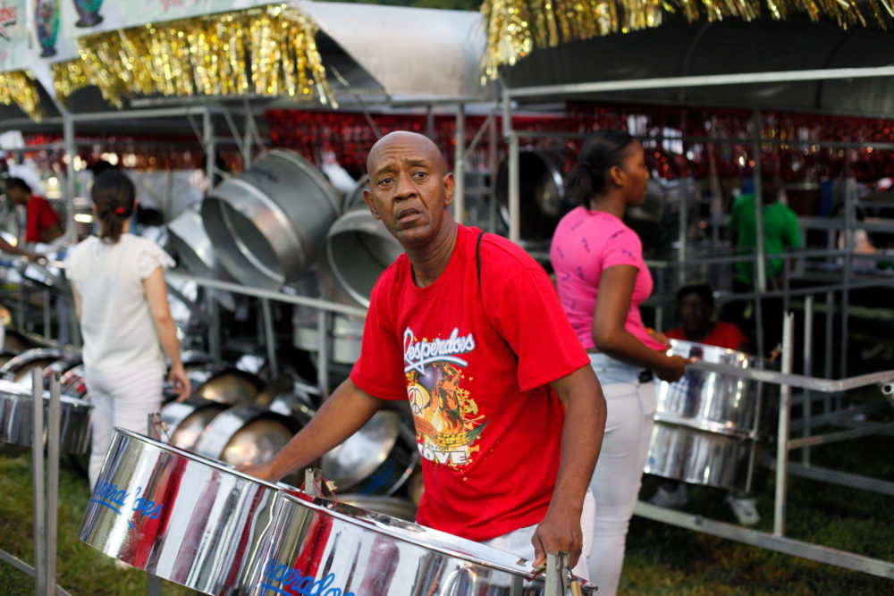A pannist with Desperadoes rehearses on the drag